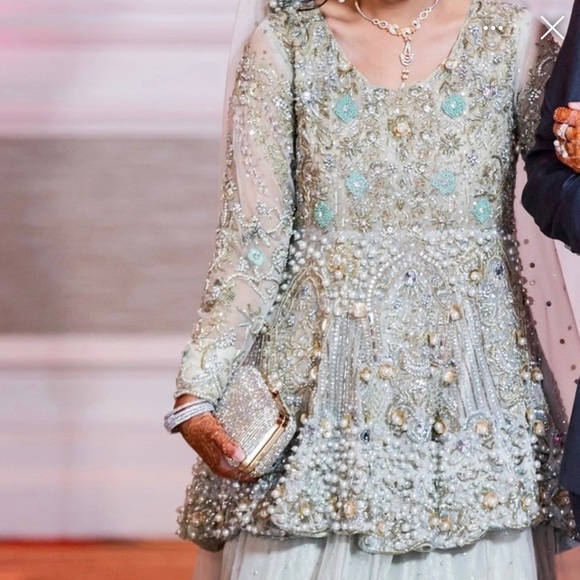 Ivory colour Bridal peplum with lehnga. And pearl worked dupatta. - Picture 2 of 3